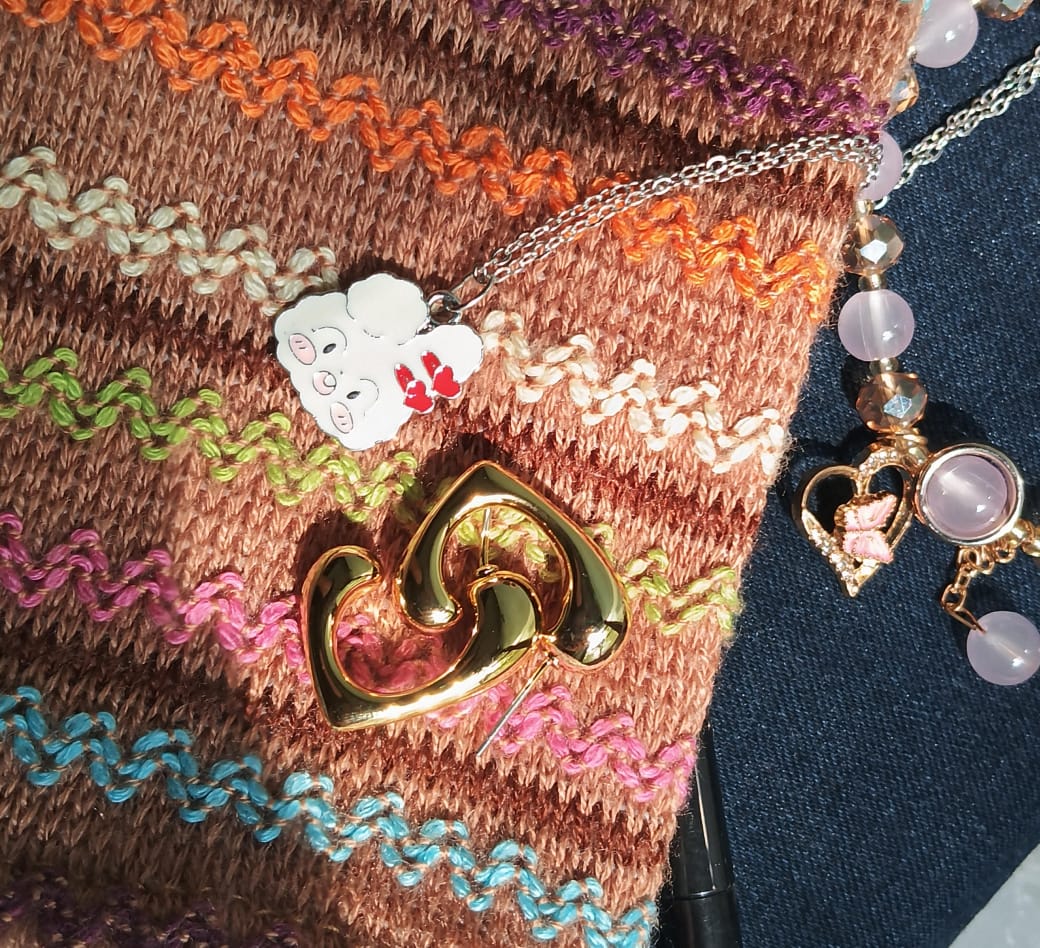 The gold toned curved hoop